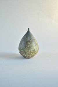 Pale blue pear shaped bottle form