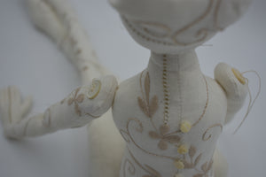 Tan Cotton Embroidered Figure