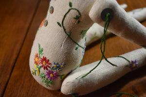Floral Embroidered Figure