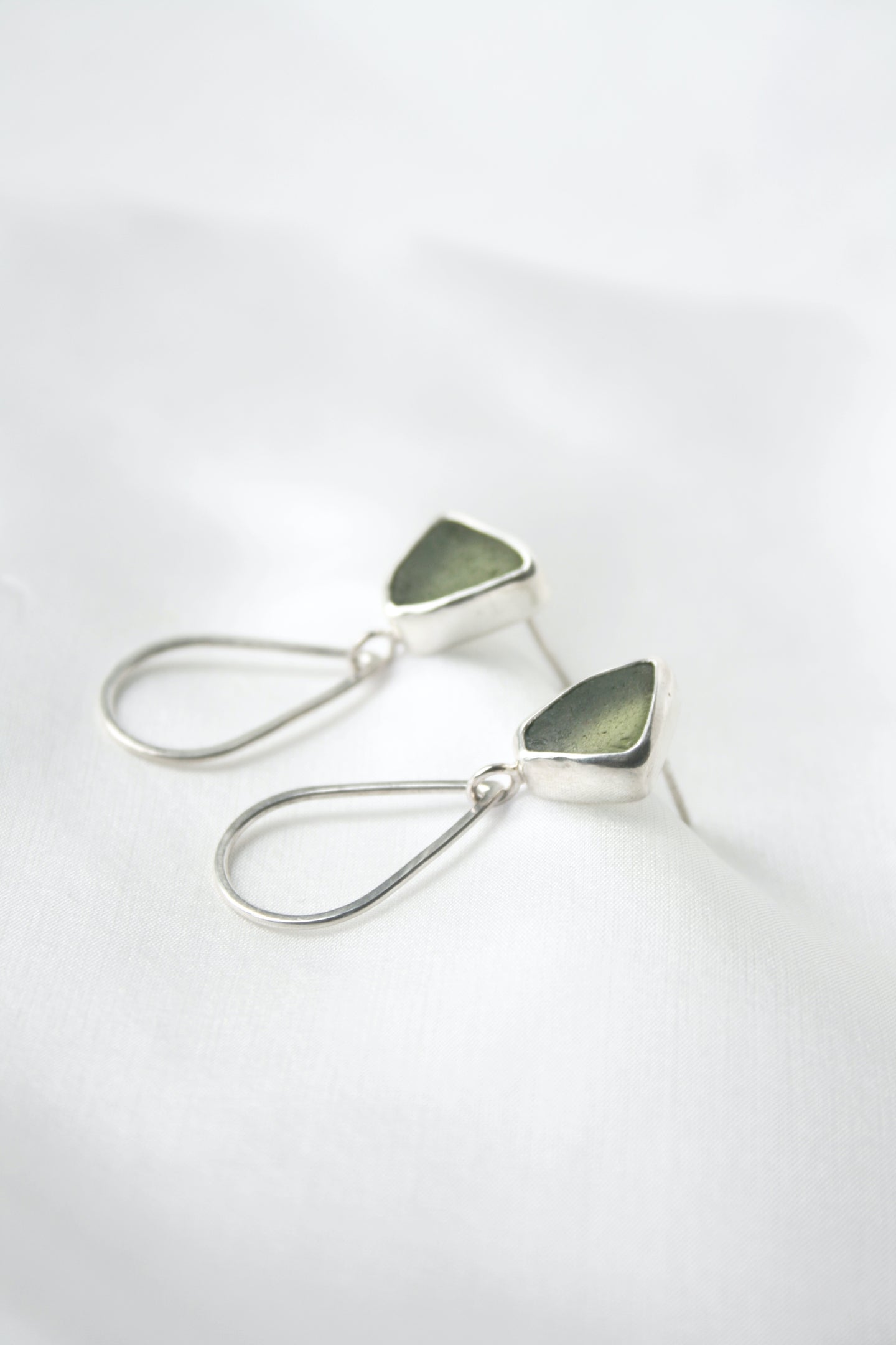 Green sea glass teardrop and silver earrings