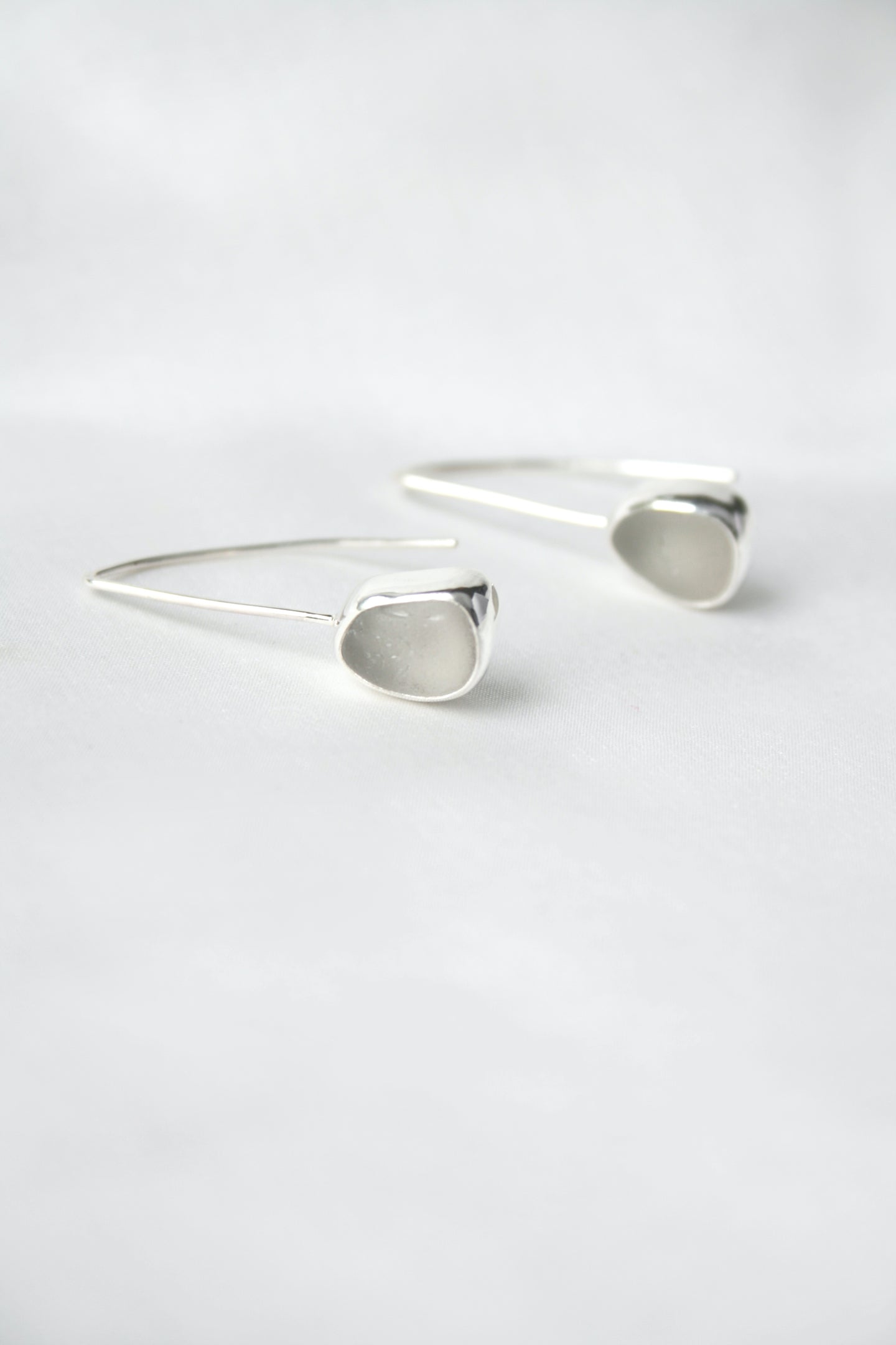 White sea glass and silver drop earrings