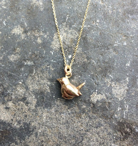 Gold bird necklace made with eco gold