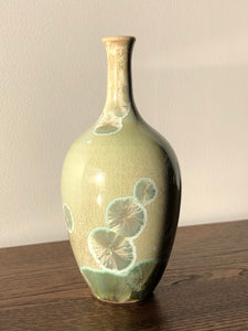 Small green crystalline vase