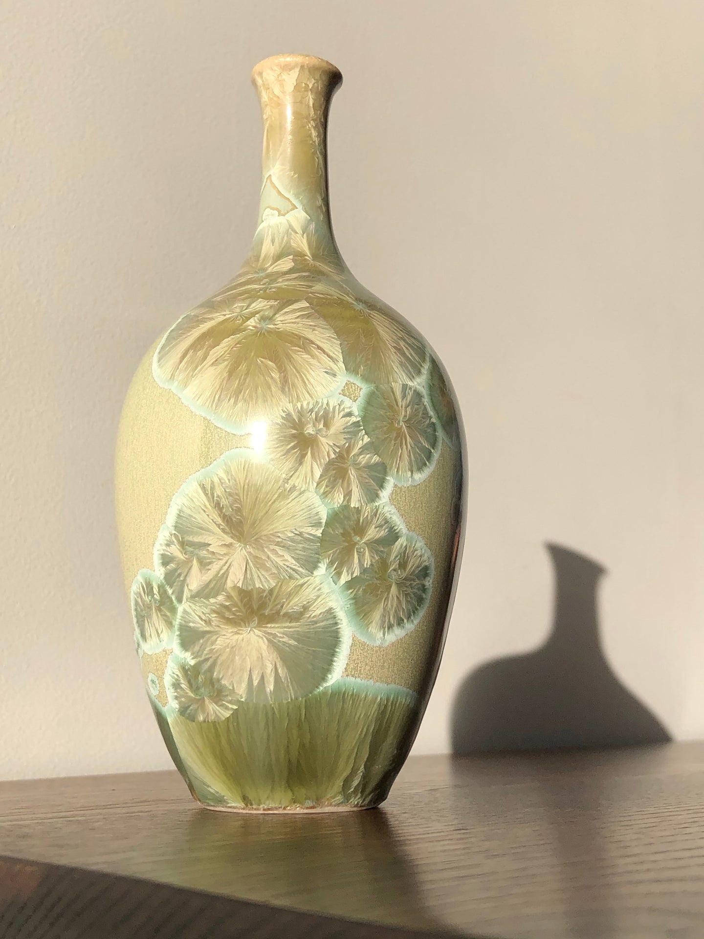 Small green crystalline vase