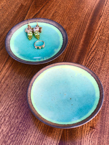 Tiny green dishes