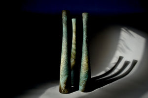 Tall textured smoke fired forms