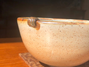 Unique stoneware Bowl with single lug