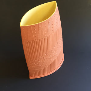 Terracotta vessel with yellow interrior